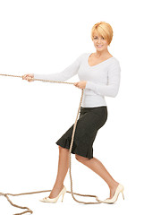 Image showing business woman pulling rope