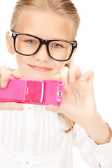 Image showing happy girl taking picture with cell phone