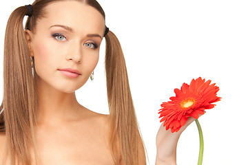 Image showing lovely woman with red flower