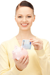 Image showing lovely woman with piggy bank 