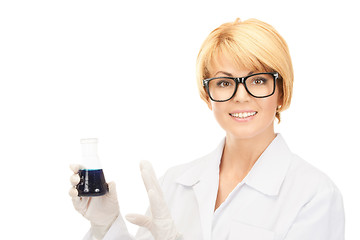 Image showing lab worker holding up test tube