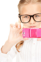 Image showing happy girl taking picture with cell phone