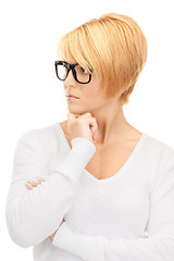 Image showing pensive businesswoman over white