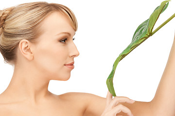 Image showing woman with green leaf