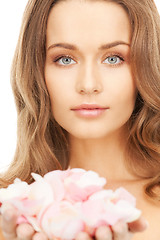 Image showing beautiful woman with rose petals