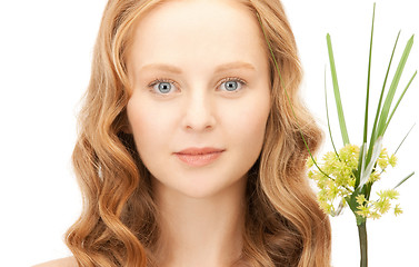 Image showing woman with green sprout