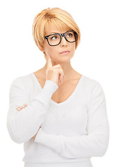 Image showing pensive businesswoman over white