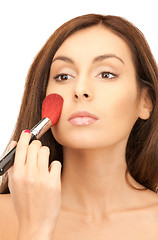 Image showing lovely woman with brush