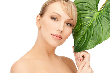 Image showing woman with green leaf