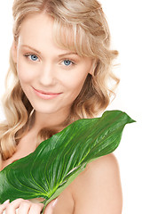 Image showing woman with green leaf