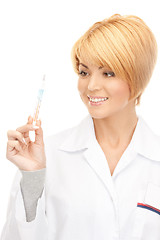 Image showing attractive female doctor with thermometer