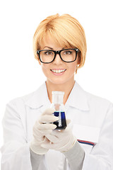 Image showing lab worker holding up test tube