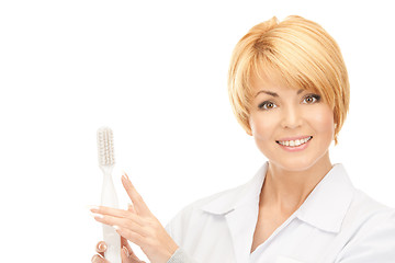 Image showing doctor with toothbrush