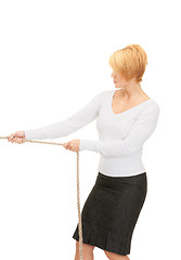 Image showing business woman pulling rope