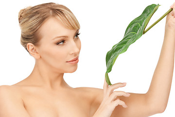 Image showing woman with green leaf