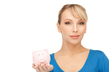 Image showing lovely woman with piggy bank