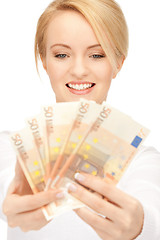 Image showing lovely woman with euro cash money