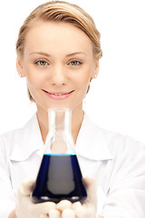 Image showing lab worker holding up test tube