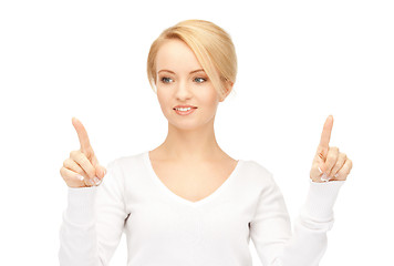 Image showing businesswoman working with something imaginary