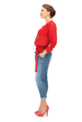 Image showing lovely woman in red blouse and jeans