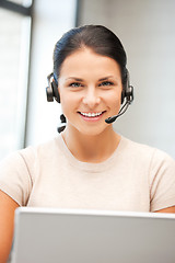 Image showing helpline operator with laptop computer