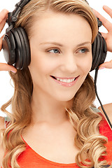 Image showing happy teenage girl in big headphones