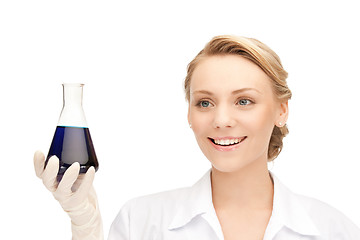 Image showing lab worker holding up test tube