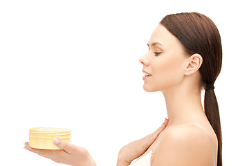 Image showing beautiful woman with moisturizing creme