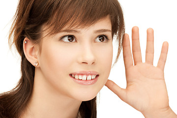 Image showing teenage girl listening gossip