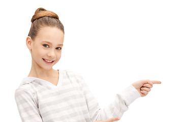 Image showing teenage girl pointing her finger