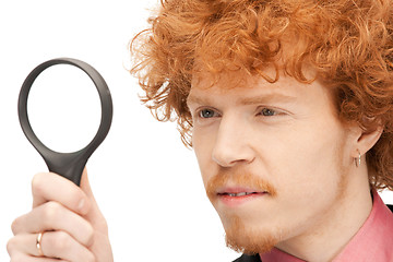 Image showing man with magnifying glass