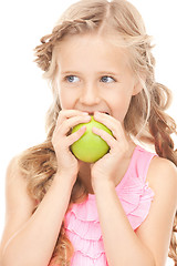 Image showing little girl with green apple