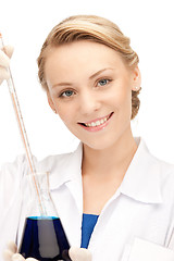 Image showing lab worker holding up test tube