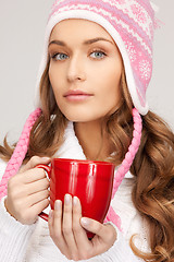 Image showing woman with red mug