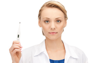 Image showing attractive female doctor with thermometer