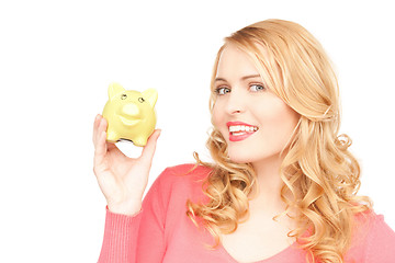 Image showing lovely woman with piggy bank