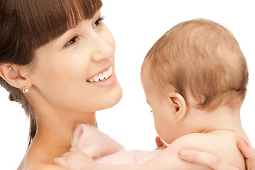 Image showing happy mother with adorable baby