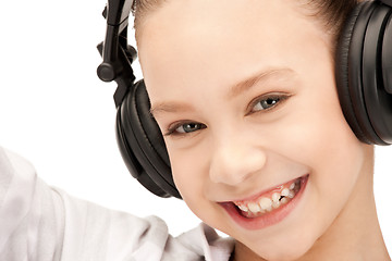 Image showing happy teenage girl in big headphones