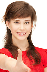 Image showing teenage girl with an open hand ready for handshake