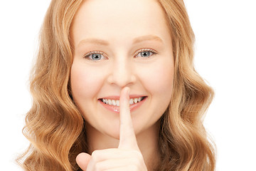 Image showing finger on lips