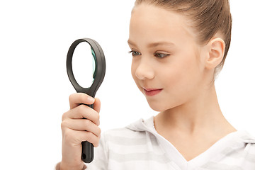 Image showing teenage girl with magnifying glass