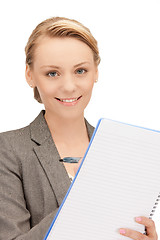 Image showing happy woman with big notepad