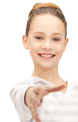 Image showing teenage girl with an open hand ready for handshake