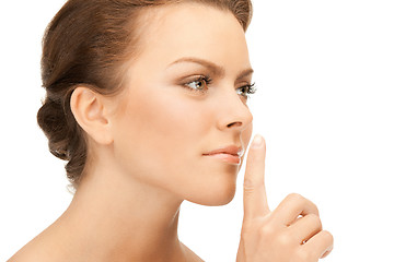 Image showing finger on lips