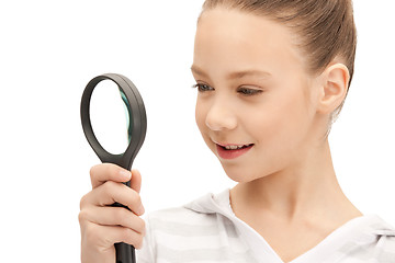 Image showing teenage girl with magnifying glass