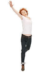 Image showing jumping man in  white shirt