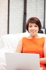 Image showing happy woman with laptop computer