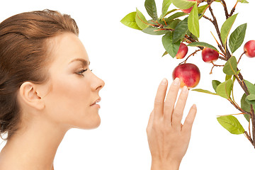 Image showing lovely woman with apple twig