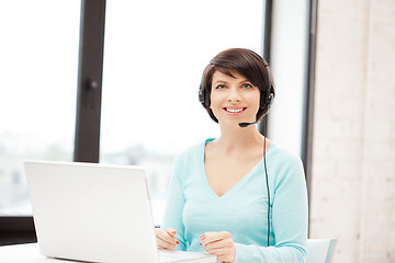 Image showing helpline operator with laptop computer