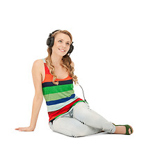 Image showing happy teenage girl in big headphones